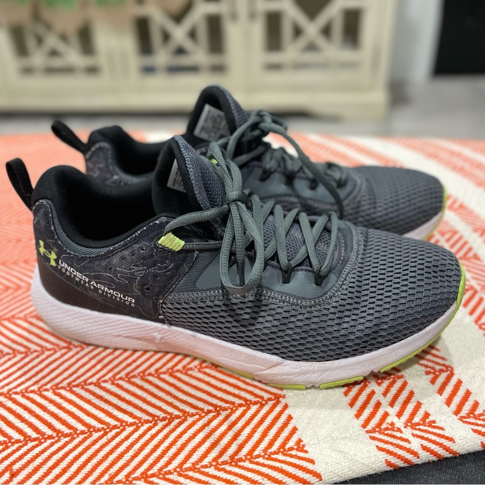 Under Armour black, gray, & green sneakers.